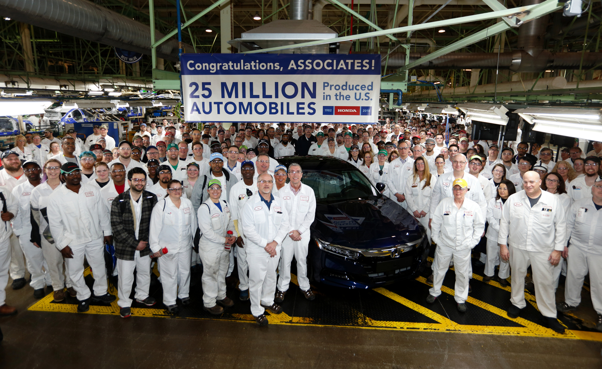 Honda associates at the Marysville Auto Plant in Ohio surround a